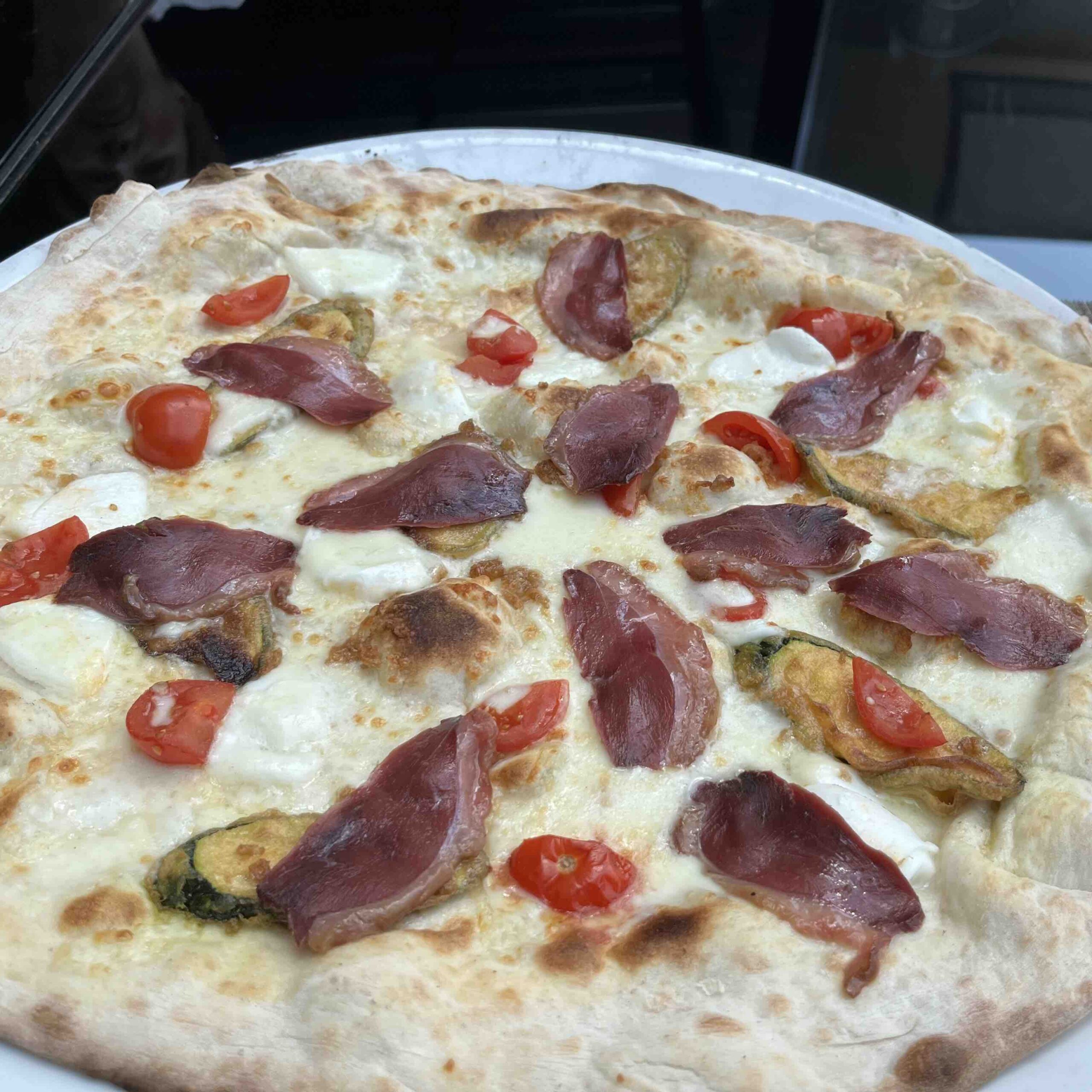 Pizza con petto d'oca